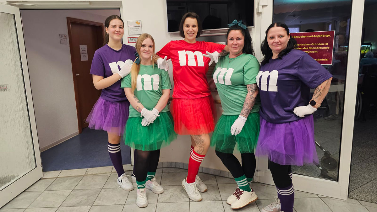 Colleagues in M&M costumes at the Am Görnsee residential home for the elderly