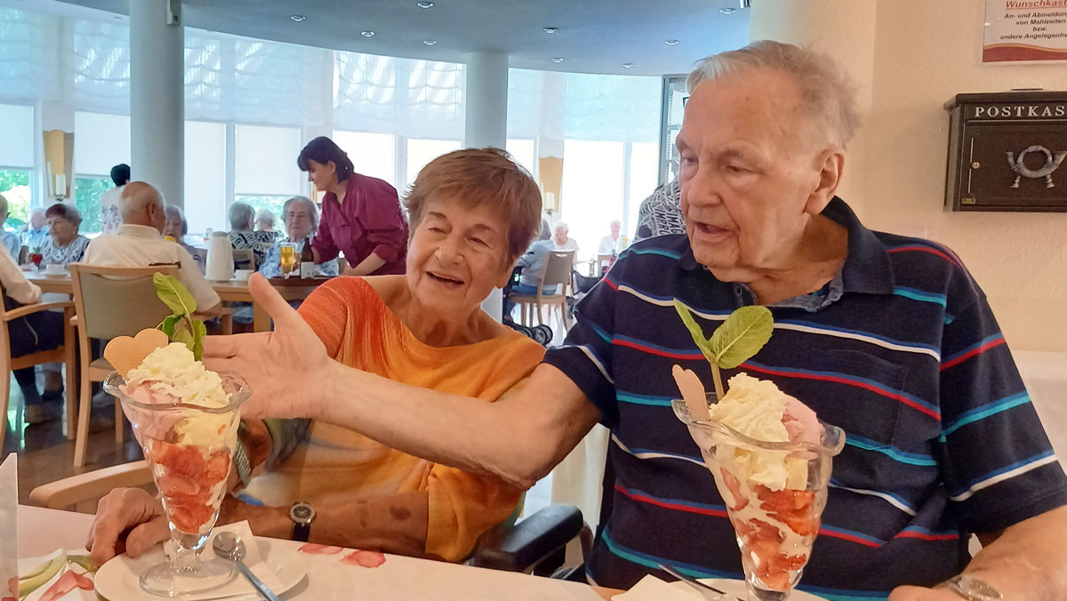 Elderly people eat a giant portion of ice cream